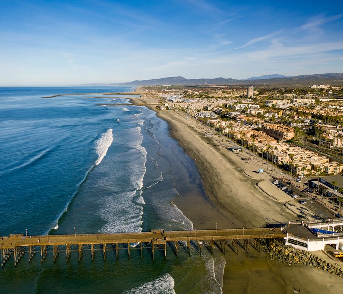 Oceanside coastline and community viewed from above