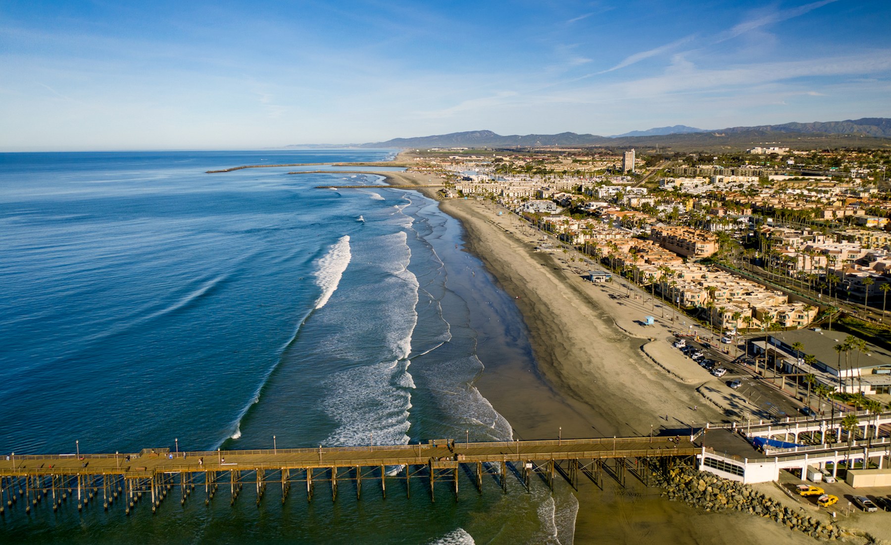 Aerial view of Oceanside’s coastline and community
